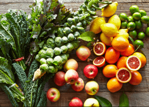a group of fruits and vegetables on a wood surface Healthy Weight Loss Diets Bury